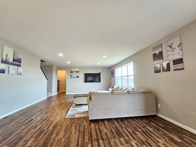 2505 Jaber Ave NE, Saint Michael, MN 55376 - living room featuring dark wood-style flooring, recessed lighting, baseboards, and a textured ceiling