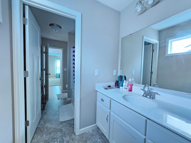 2505 Jaber Ave NE, Saint Michael, MN 55376 - full bath featuring vanity, baseboards, and shower / tub combo