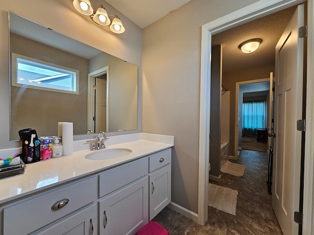 2505 Jaber Ave NE, Saint Michael, MN 55376 - full bathroom featuring vanity, toilet, a textured ceiling, shower / tub combination, and baseboards