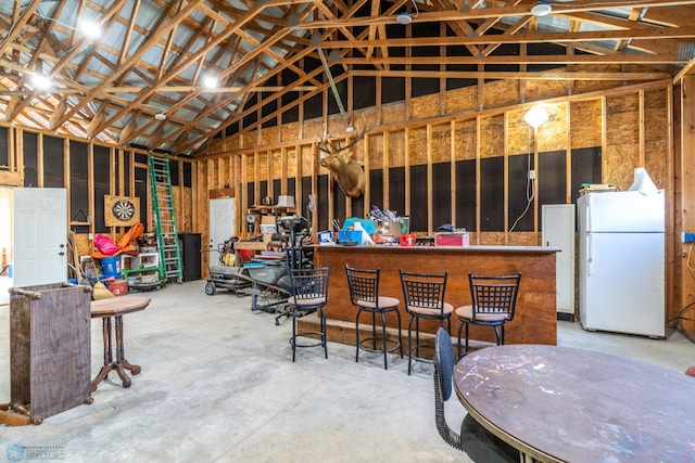 garage with freestanding refrigerator