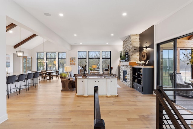 kitchen with white cabinetry, recessed lighting, pendant lighting, and light wood-type flooring