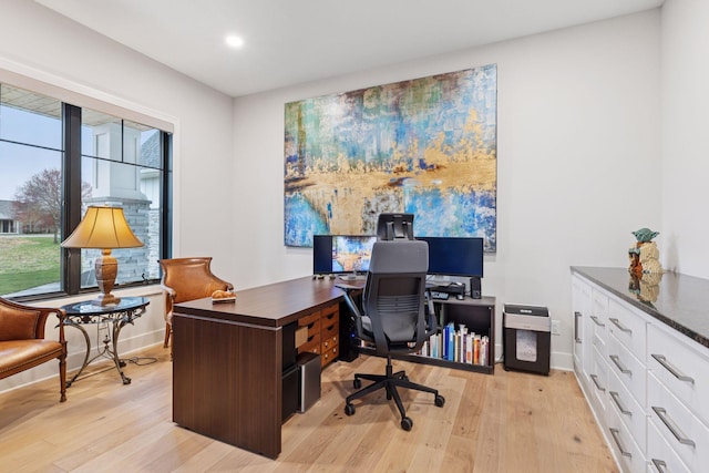 office area with baseboards, recessed lighting, and light wood-type flooring