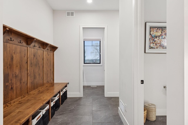 mudroom with baseboards, visible vents, and recessed lighting