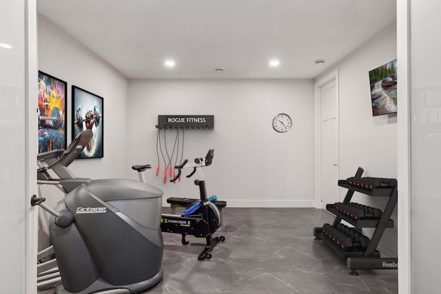 workout room with baseboards and recessed lighting