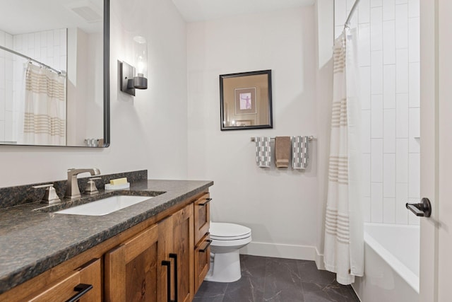 full bath featuring baseboards, marble finish floor, toilet, vanity, and shower / bath combo