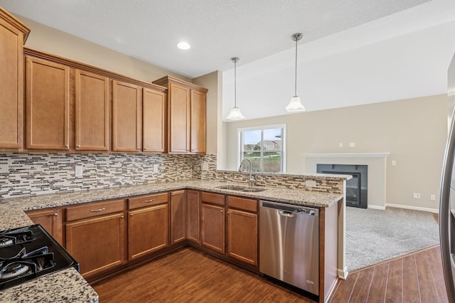 kitchen with a sink, backsplash, dark wood-style floors, and dishwasher