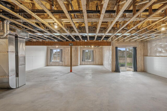 basement featuring heating unit