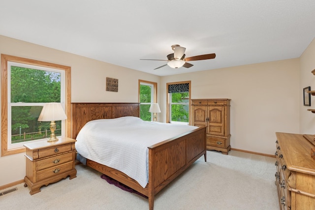 813 Quie Ln, Northfield, MN 55057 - bedroom featuring light colored carpet, baseboards, and a ceiling fan