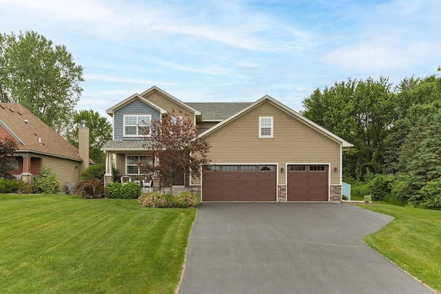 7387 Old Mill Rd, Centerville, MN 55038 - craftsman house featuring driveway, a front lawn, a garage, a porch, and stone siding