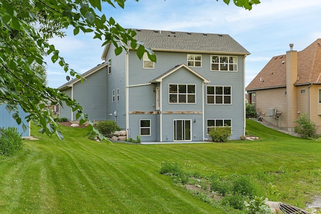 7387 Old Mill Rd, Centerville, MN 55038 - back of property featuring a yard and cooling unit