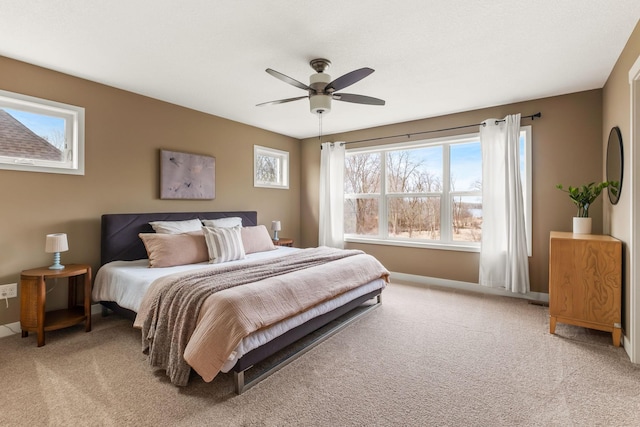 7387 Old Mill Rd, Centerville, MN 55038 - bedroom with light colored carpet and a ceiling fan