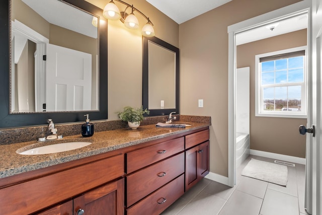 7387 Old Mill Rd, Centerville, MN 55038 - bathroom featuring double vanity and tile patterned flooring