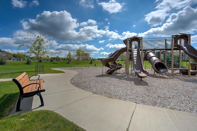 communal playground with a lawn