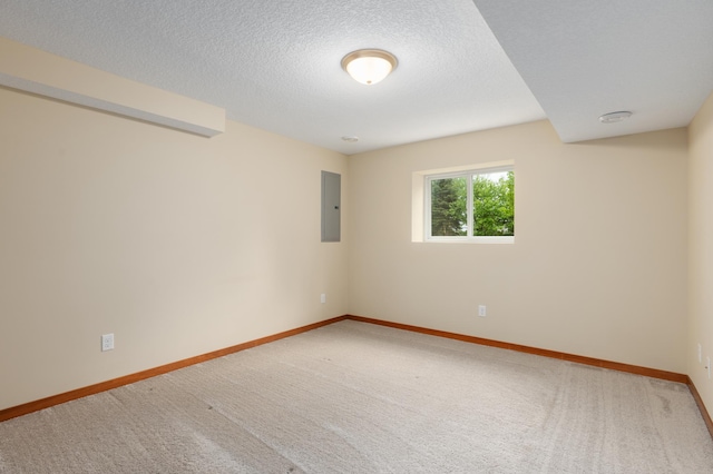 1715 107th St, New Richmond, WI 54017 - carpeted empty room featuring electric panel, baseboards, and a textured ceiling