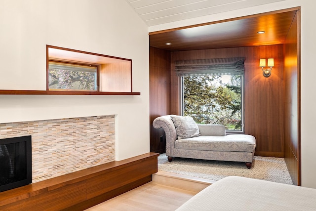 4721 Lake Harriet Pkwy, Minneapolis, MN 55419 - living area with a tiled fireplace, wood finished floors, and wooden walls
