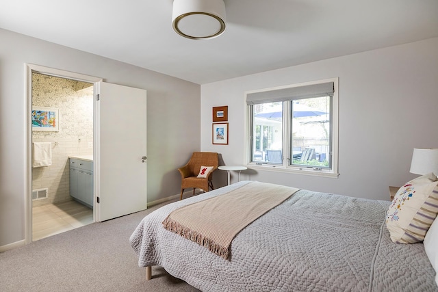4721 Lake Harriet Pkwy, Minneapolis, MN 55419 - bedroom featuring light colored carpet and ensuite bathroom