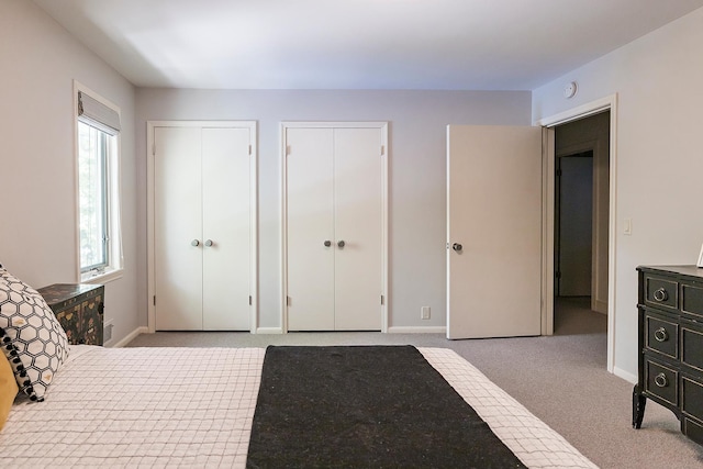 4721 Lake Harriet Pkwy, Minneapolis, MN 55419 - carpeted bedroom with two closets and baseboards