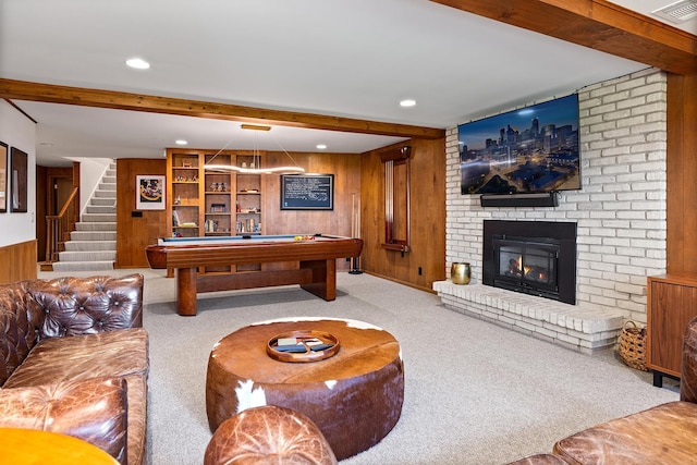 4721 Lake Harriet Pkwy, Minneapolis, MN 55419 - game room with wood walls, carpet, billiards table, a fireplace, and beamed ceiling
