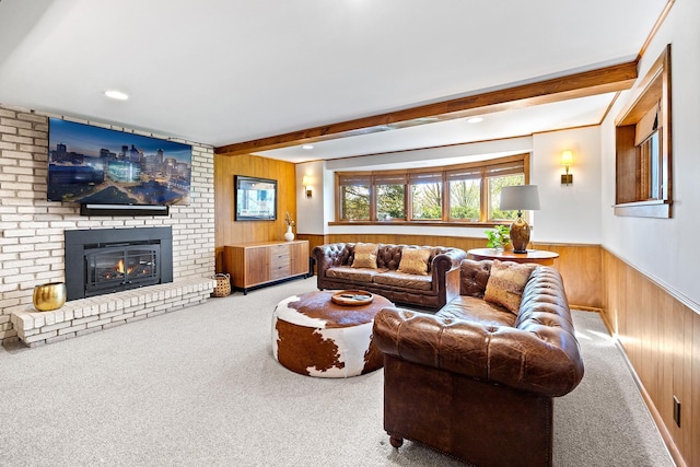 4721 Lake Harriet Pkwy, Minneapolis, MN 55419 - carpeted living room featuring wooden walls, beam ceiling, a brick fireplace, a wainscoted wall, and recessed lighting