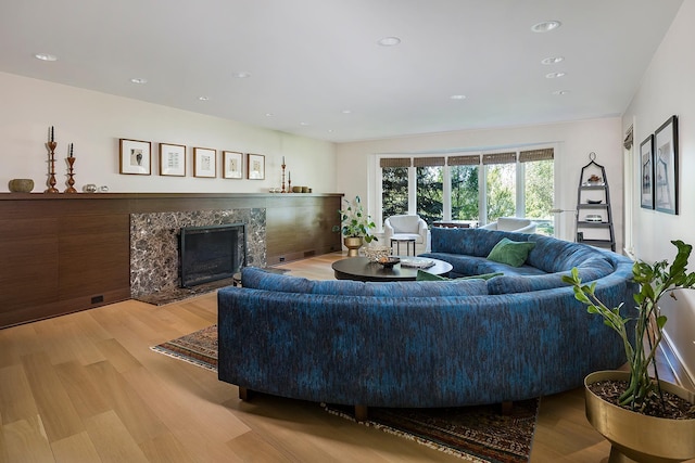 4721 Lake Harriet Pkwy, Minneapolis, MN 55419 - living room featuring light wood-style flooring, a high end fireplace, and recessed lighting