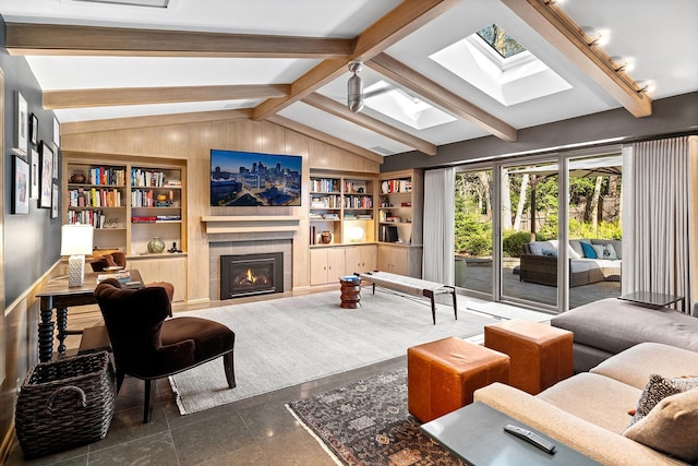 4721 Lake Harriet Pkwy, Minneapolis, MN 55419 - living room with a skylight, a tiled fireplace, and built in features
