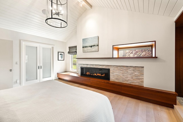 4721 Lake Harriet Pkwy, Minneapolis, MN 55419 - bedroom with hardwood / wood-style floors, a wooden ceiling with exposed beams, french doors, a glass covered fireplace, and high vaulted ceiling