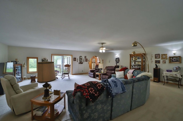 7717 Lake May Rd NW, Walker, MN 56433 - living area featuring light colored carpet and ceiling fan
