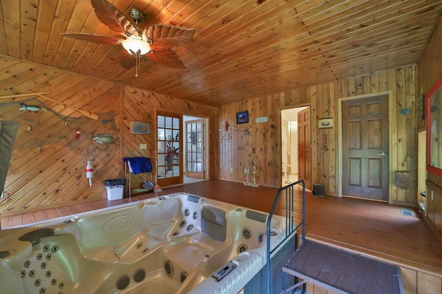 7717 Lake May Rd NW, Walker, MN 56433 - dining area featuring wooden walls, wooden ceiling, hardwood / wood-style floors, and ceiling fan