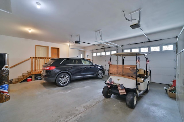 7717 Lake May Rd NW, Walker, MN 56433 - garage featuring a garage door opener