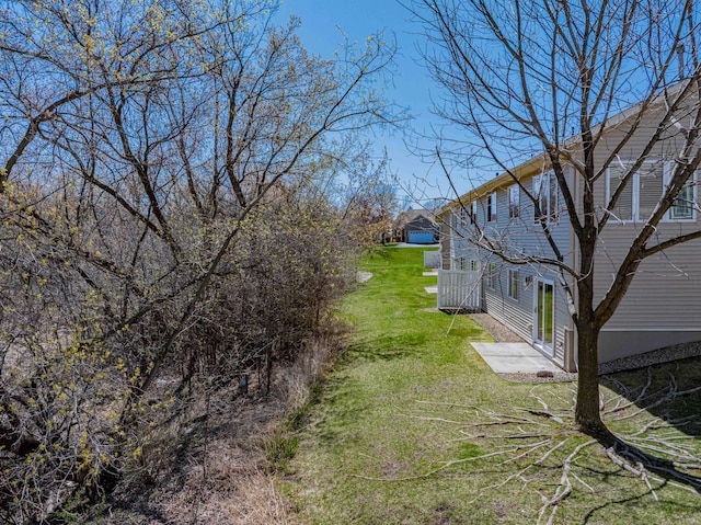 exterior space with a lawn and central air condition unit