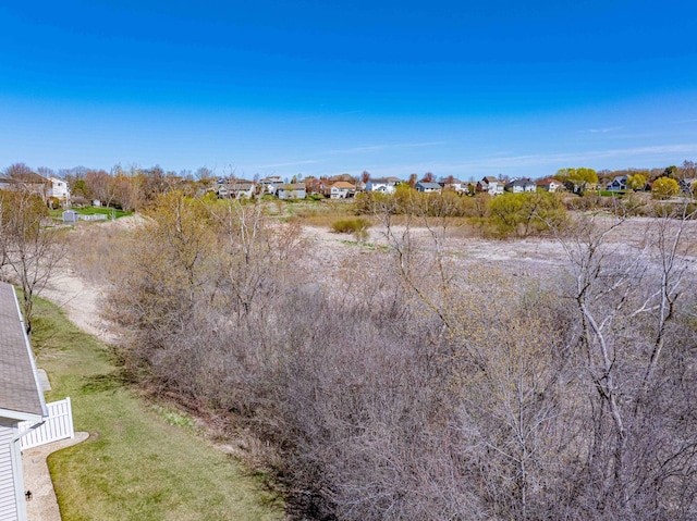view of local wilderness with a residential view