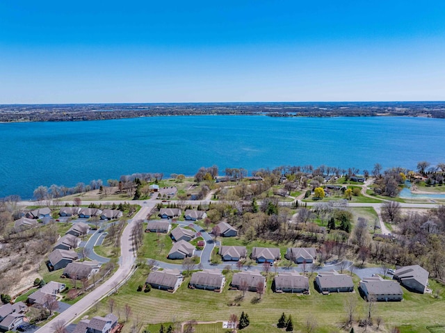 aerial view with a residential view and a water view