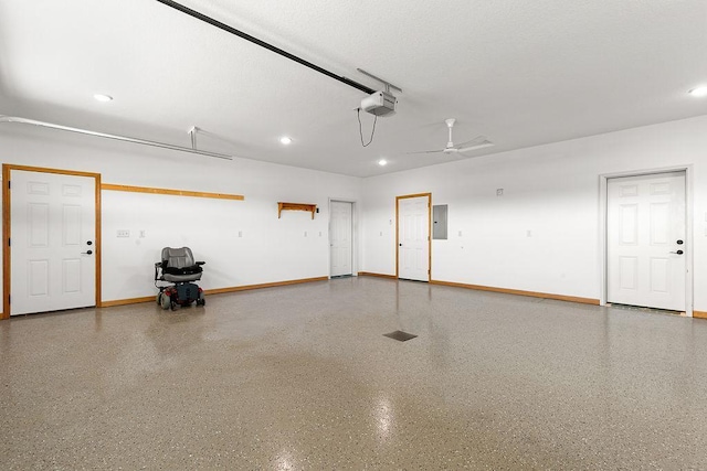 garage with ceiling fan, electric panel, baseboards, a garage door opener, and recessed lighting