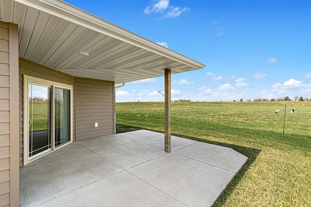 view of patio with a rural view