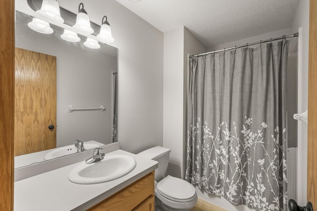 664 Highland Trl, Lino Lakes, MN 55014 - bathroom featuring vanity, a textured ceiling, and shower / tub combo