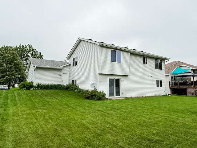 664 Highland Trl, Lino Lakes, MN 55014 - rear view of house featuring a gazebo and a lawn