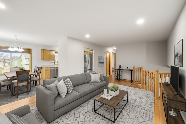 664 Highland Trl, Lino Lakes, MN 55014 - living area with a chandelier, light wood-style flooring, and recessed lighting