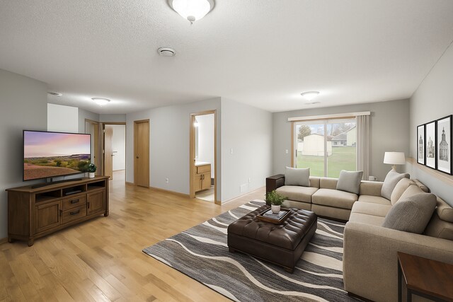 664 Highland Trl, Lino Lakes, MN 55014 - living area featuring light wood-style floors and baseboards