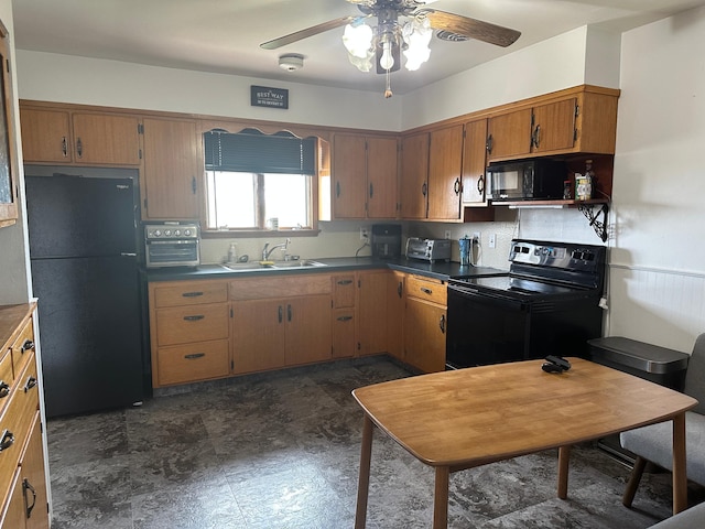 kitchen with black appliances, brown cabinets, a ceiling fan, and a sink
