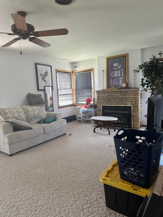 living room featuring ceiling fan, carpet flooring, and a brick fireplace