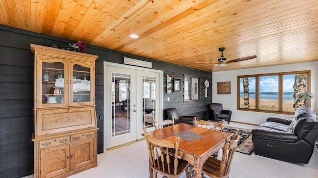 7355 Little Mary Cir SW, Alexandria, MN 56308 - dining area with french doors, wooden ceiling, light carpet, healthy amount of natural light, and a ceiling fan