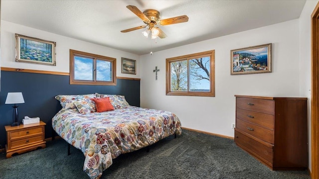 7355 Little Mary Cir SW, Alexandria, MN 56308 - bedroom with dark colored carpet, baseboards, and a ceiling fan