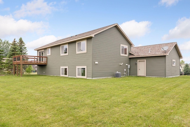 116 Wheat Field Ln, New Richmond, WI 54017 - back of property with a deck, a yard, and a shingled roof