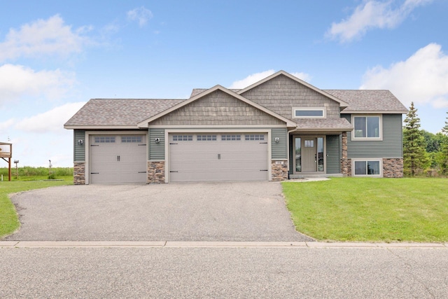 116 Wheat Field Ln, New Richmond, WI 54017 - craftsman inspired home featuring stone siding, a garage, driveway, a front yard, and a shingled roof
