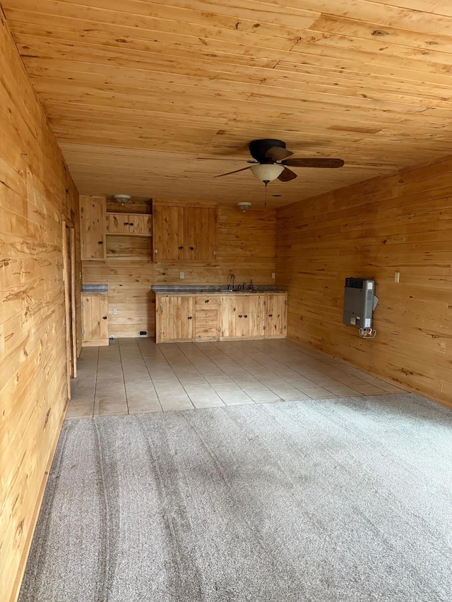 52325 County Road 31, Wirt, MN 56688 - unfurnished room with wooden walls, ceiling fan, wooden ceiling, and a sink
