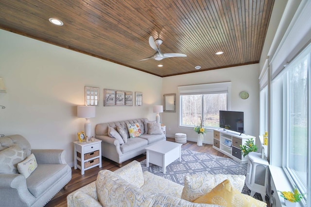 living room with baseboards, ceiling fan, wood ceiling, and wood finished floors