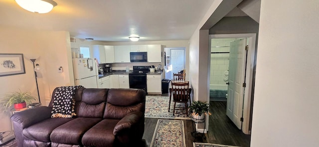 living area featuring dark wood finished floors