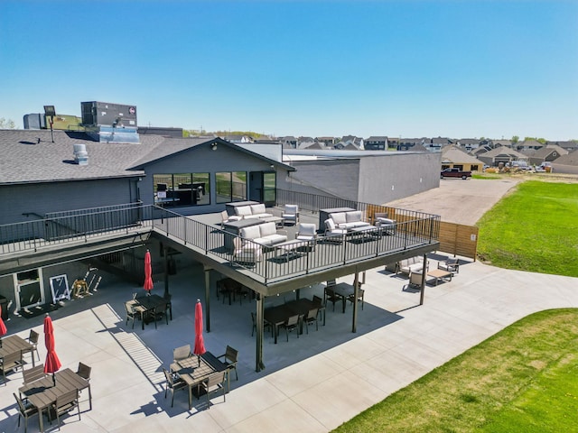 11504 Yuma Ln N, Dayton, MN 55369 - back of property with an outdoor living space, central air condition unit, a residential view, a patio area, and outdoor dining space