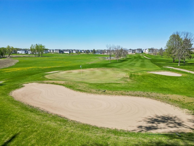 11504 Yuma Ln N, Dayton, MN 55369 - view of home's community featuring an area to practice putting, view of golf course, and a lawn