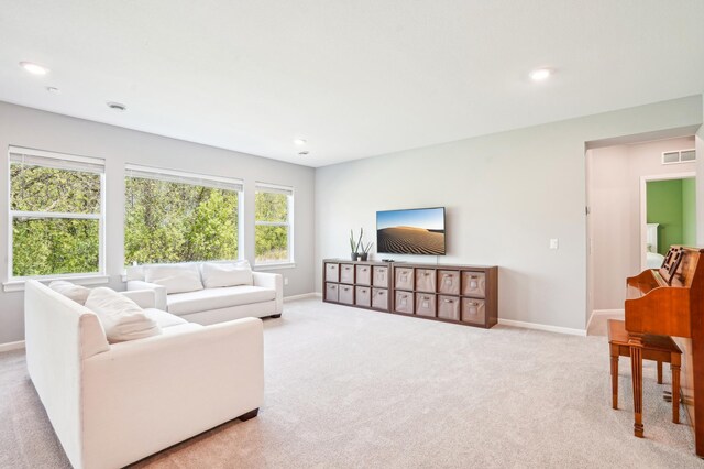 11504 Yuma Ln N, Dayton, MN 55369 - carpeted living room featuring baseboards and recessed lighting
